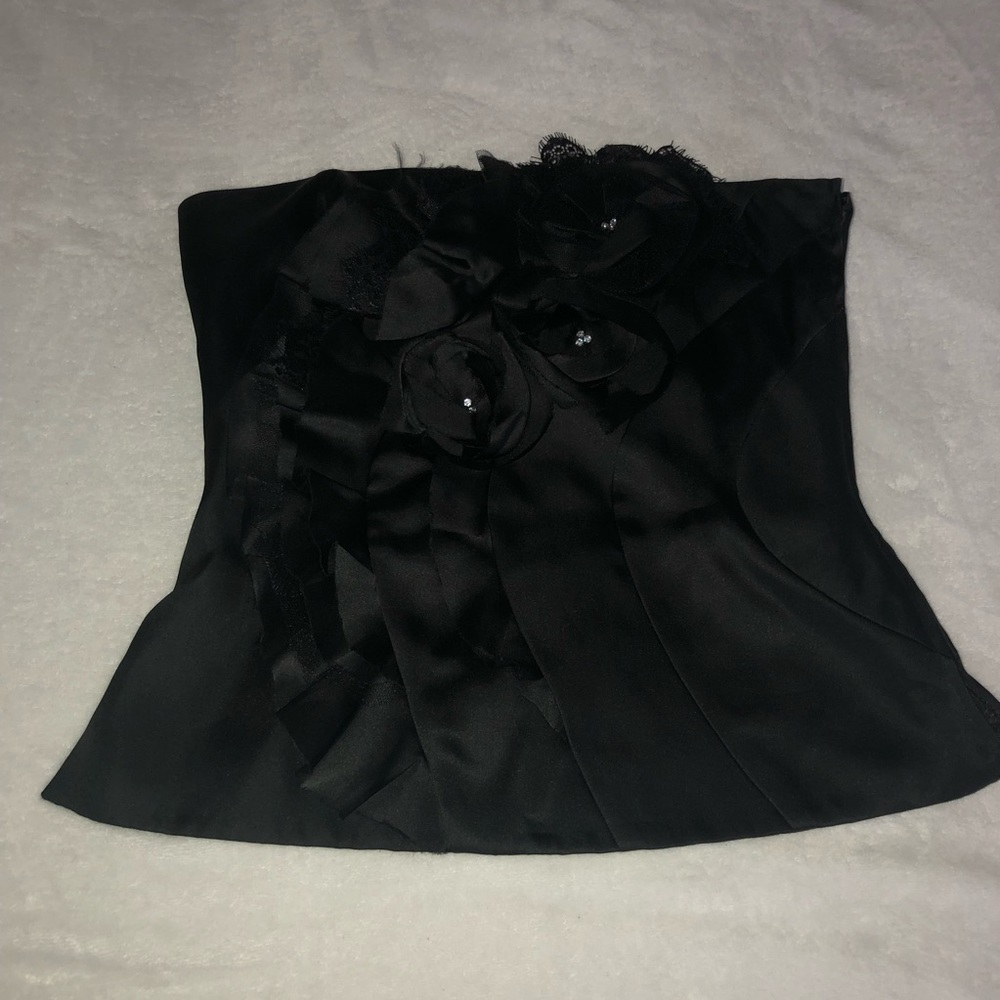 Black strapless top with rose and lace design